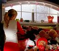 Claire's stuffed animal collection is kept in her room in the Bennets' home.