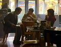After escaping from Primatech Paper Co., Matt, Ted, and Mr. Bennet sit in the Burnt Toast Diner and discuss their plans for toppling the Company.