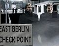 Claude passes the German border with Thompson.