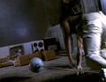 Mohinder goes down the wall. (The Butterfly Effect)