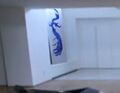 ...and a blue painting in the Kravids' home. (The Lion's Den)