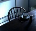 The kitchen table is visible upon entrance to the apartment.