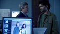 Thompson shows Mohinder an image of Molly's parents.