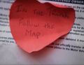 Niki finds a heart-shaped note on the back of the registration of the Cadillac convertible. (Don't Look Back)