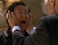 Arthur grabs Hiro's head and makes him scream. (Villains)