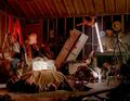 Niki wakes up in her garage to find some dead thugs. (Genesis)