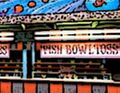 ...a fishbowl toss booth... (Slow Burn)