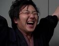 Hiro celebrates when he learns that the world was saved.
