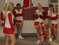 The cheerleading squad gets chatty before Homecoming.