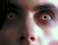 Right before he explodes, Peter's eyes glow similarly to Ted's glowing eye in Company Man. (Godsend)