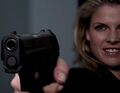 Jessica aims her gun...