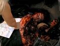 One of Linderman's thugs is stuffed in the back of a Cadillac. (Don't Look Back)