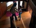 Micah greets his grandmother in her home.